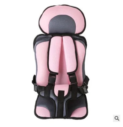 pink and black child car seat with adjustable safety harness and padded headrest