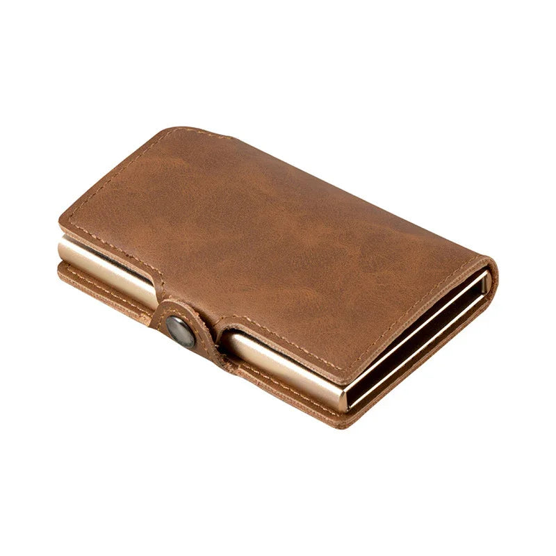 Brown leather wallet with snap button closure on white background