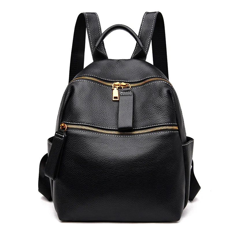 Black leather backpack with gold zippers, front pocket, and adjustable shoulder straps