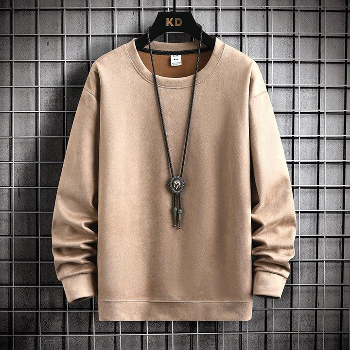 Beige casual long-sleeve sweatshirt on hanger with pendant necklace against black metal grid background