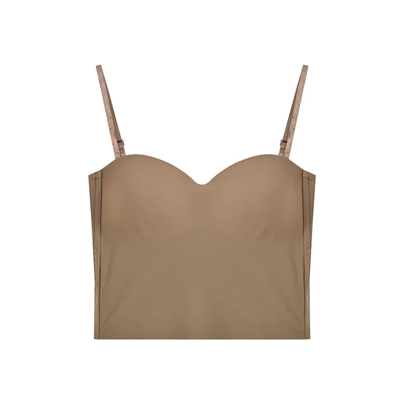 Beige strapless bustier crop top with adjustable shoulder straps on white background