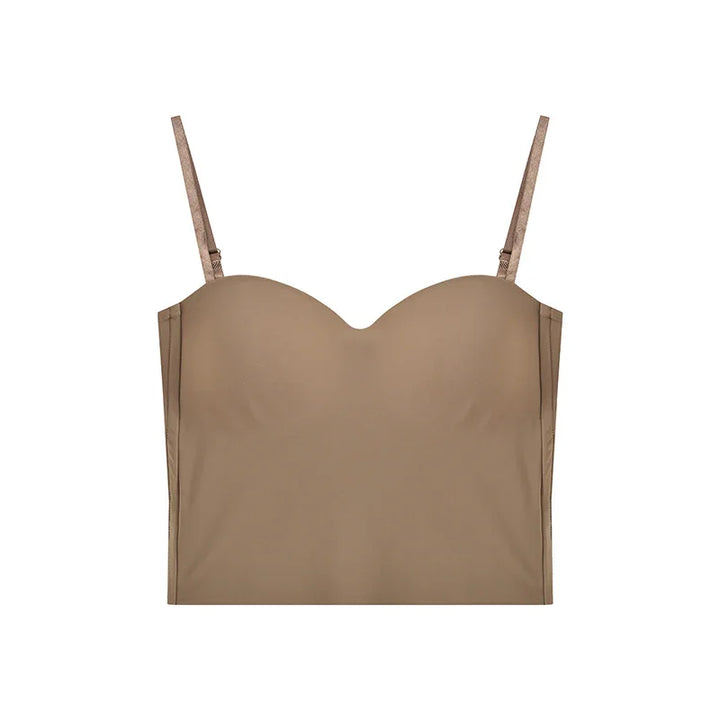 Beige strapless bustier crop top with adjustable shoulder straps on white background