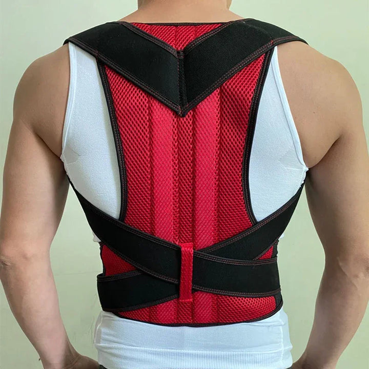 Man wearing red and black posture corrector back brace over white tank top