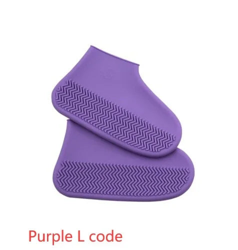 Pair of purple silicone shoe covers with textured non-slip soles, labeled purple L code