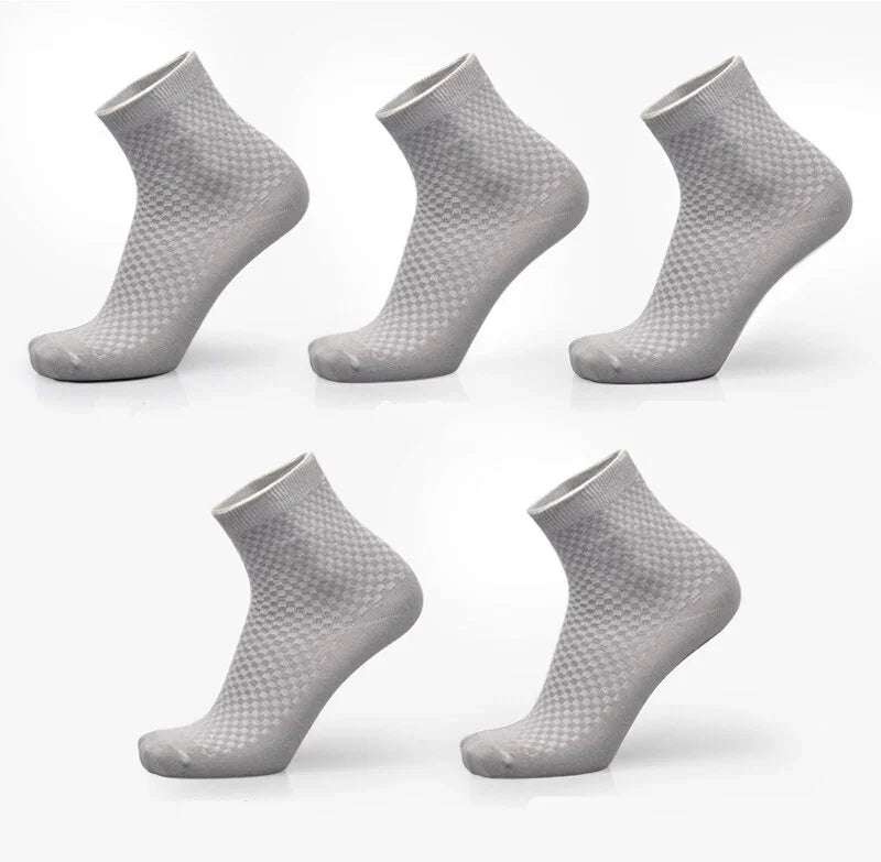 Five pairs of gray ankle socks with subtle checkered pattern displayed on white background