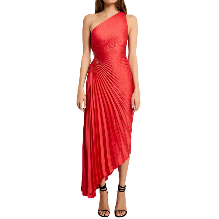 Woman wearing asymmetrical one-shoulder red pleated evening dress with black strappy heels