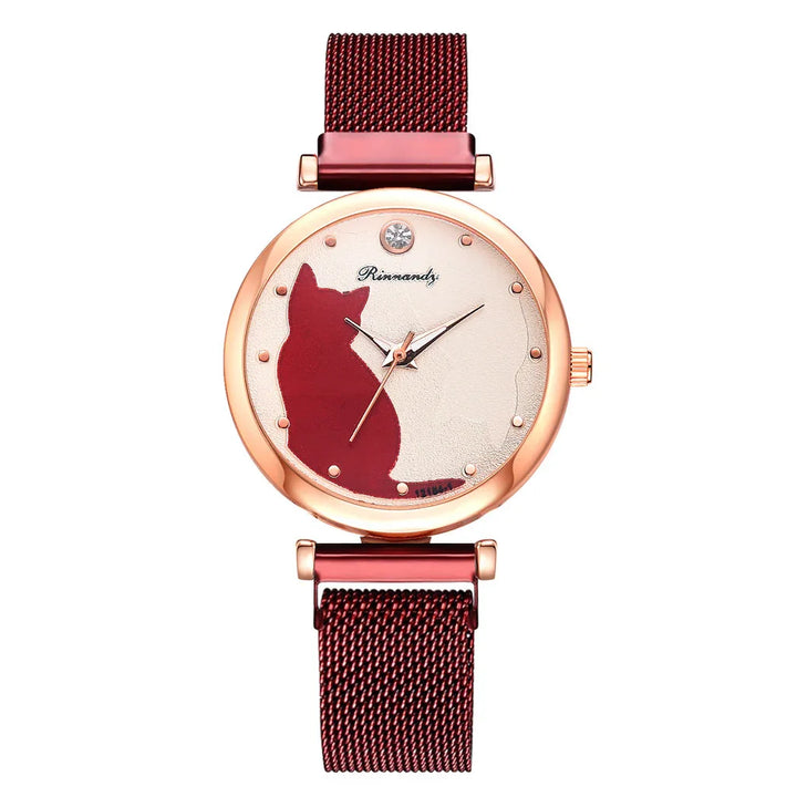 Rose gold wristwatch with red mesh band and red cat silhouette on white textured dial
