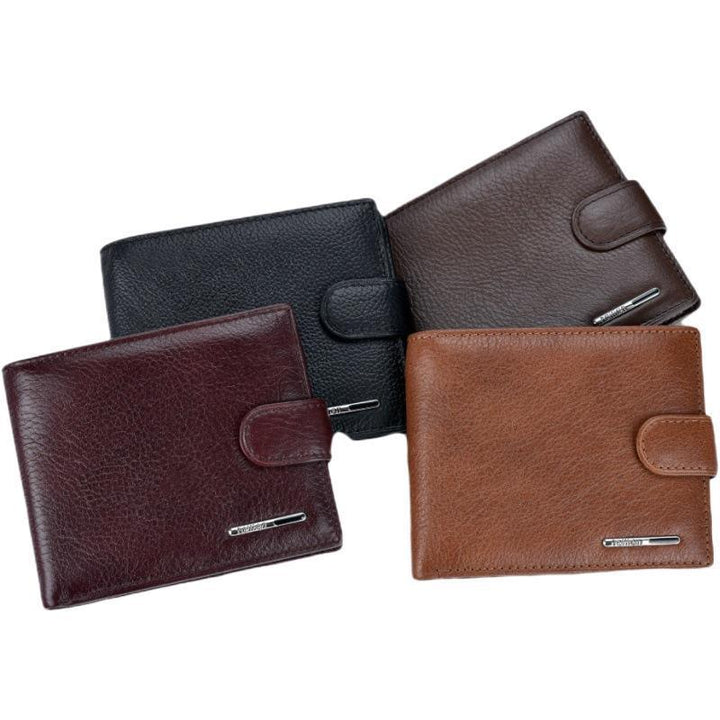 Set of four leather wallets in black, brown, tan, and burgundy with metal logo plates and snap closures