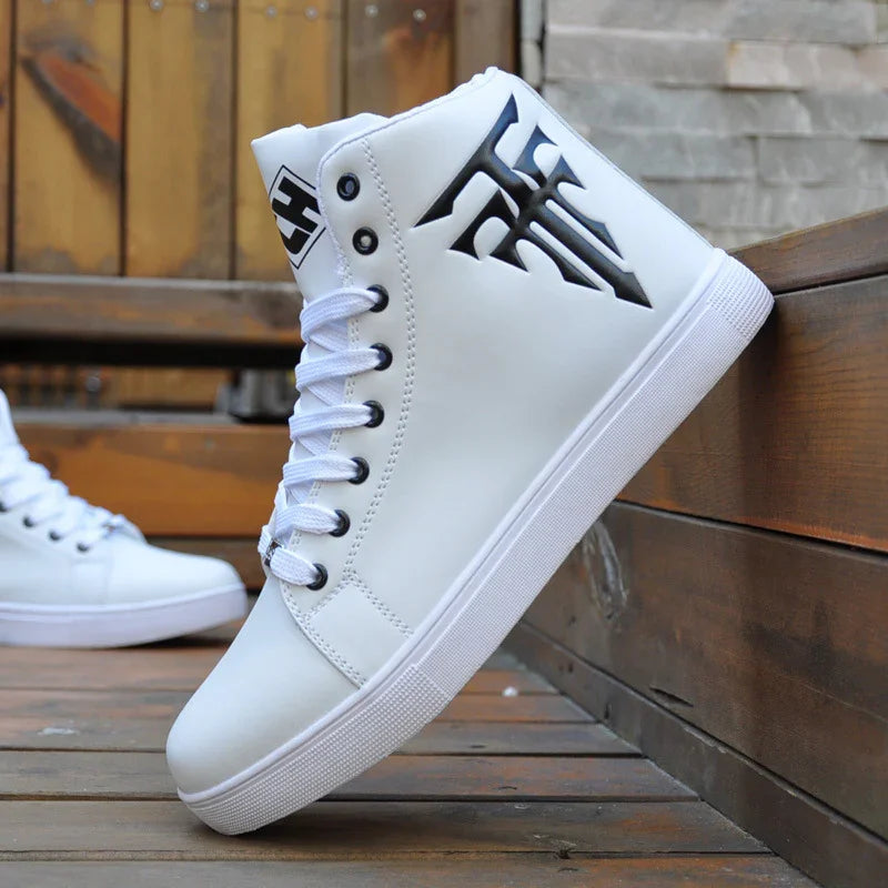 White high-top sneaker with black tribal logo on side, white laces, and textured sole on wooden floor
