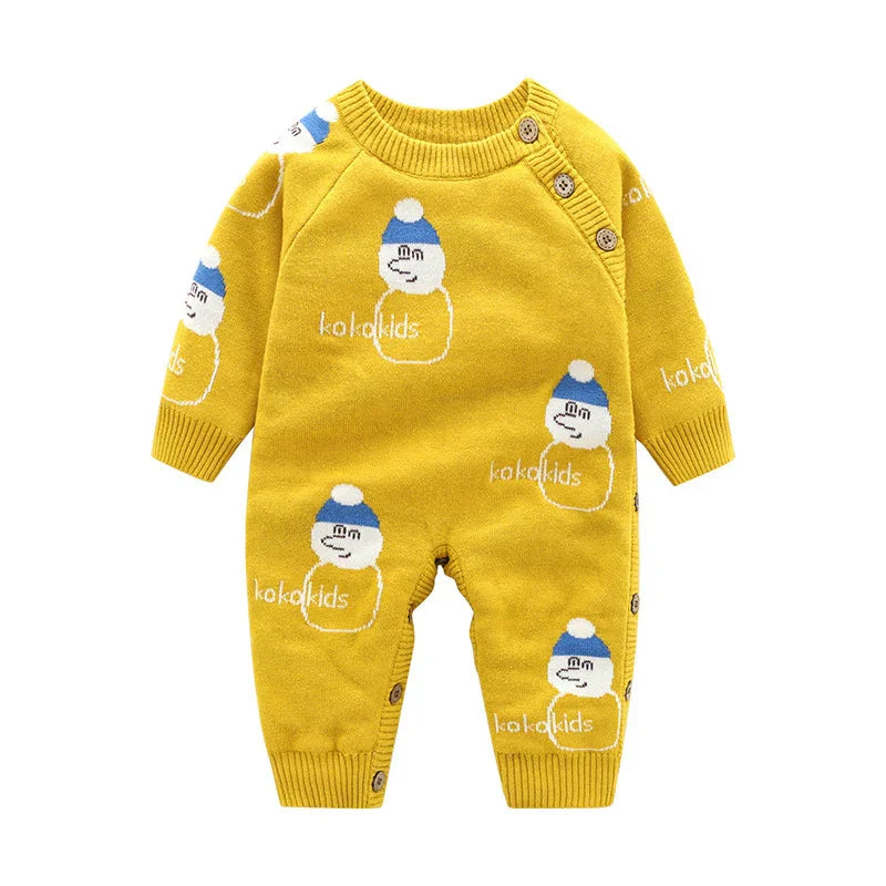 Yellow baby onesie with blue and white snowman and 'kokokids' text, button details on shoulder and legs