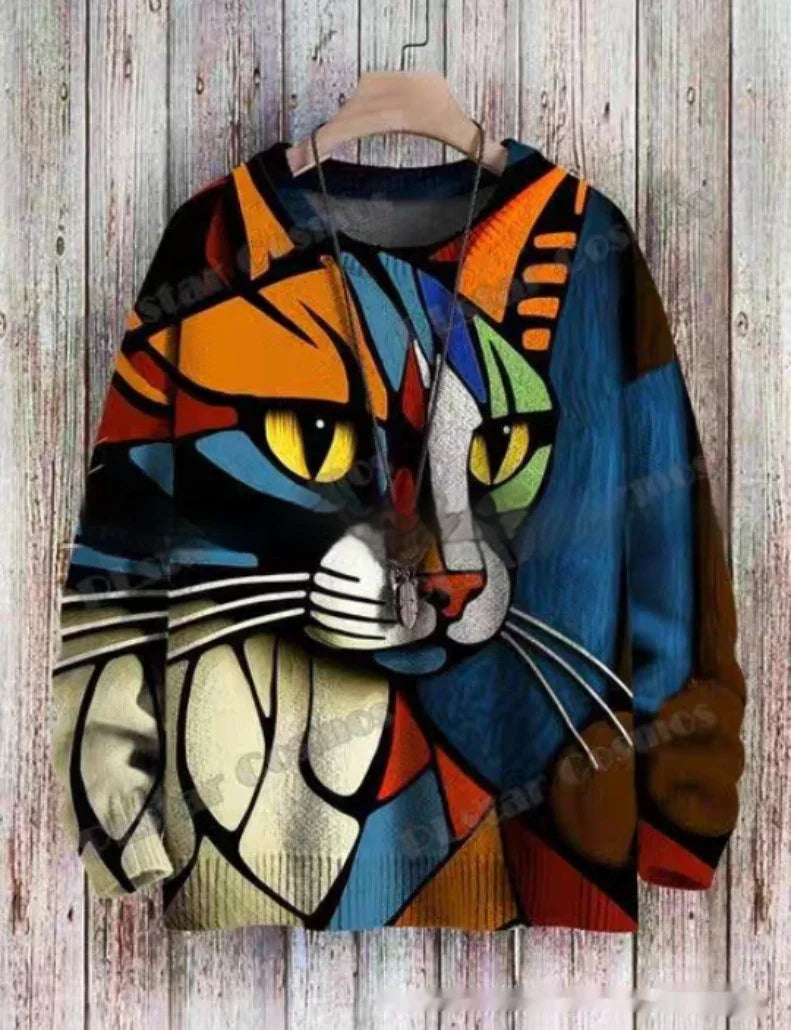 Colorful geometric cat face design on long sleeve sweatshirt hanging on wooden background