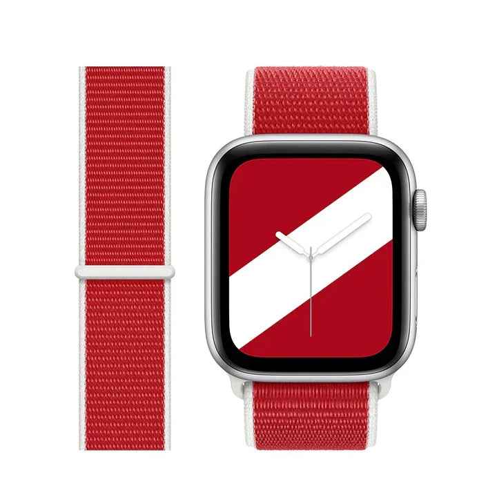 Apple Watch with red and white nylon sport loop band and matching red watch face with white diagonal stripe