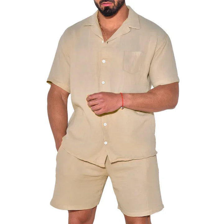 Man wearing beige short-sleeve button-up shirt and matching beige shorts casual summer outfit
