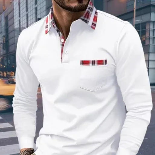 man wearing white long sleeve polo shirt with red plaid collar and chest pocket detail in urban setting