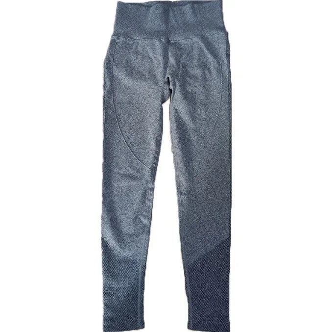 Gray high-waisted seamless leggings with textured panels and curved stitching for women