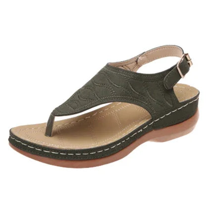 Women's olive green thong sandal with adjustable back strap and cushioned sole