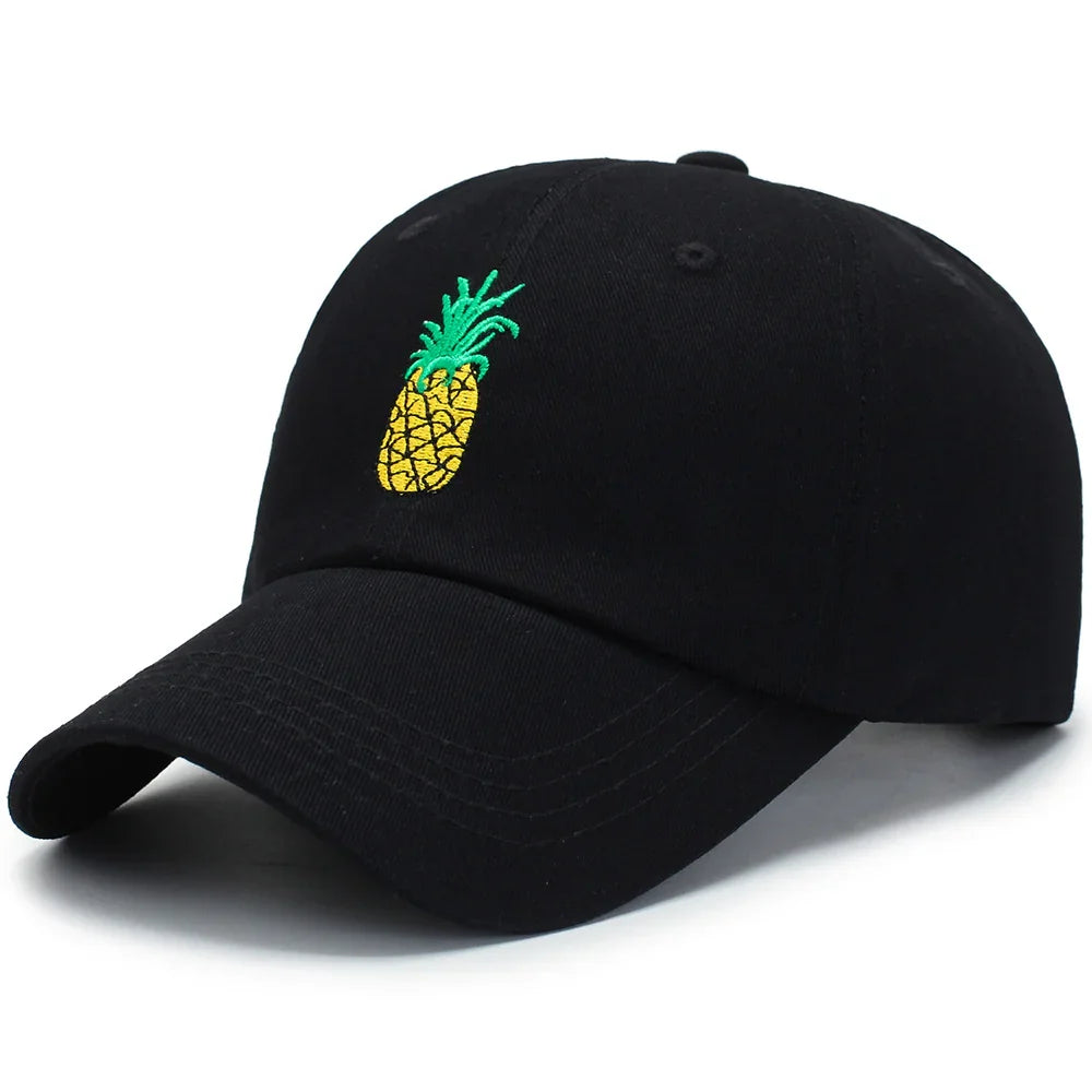 Black baseball cap with embroidered yellow and green pineapple design on front