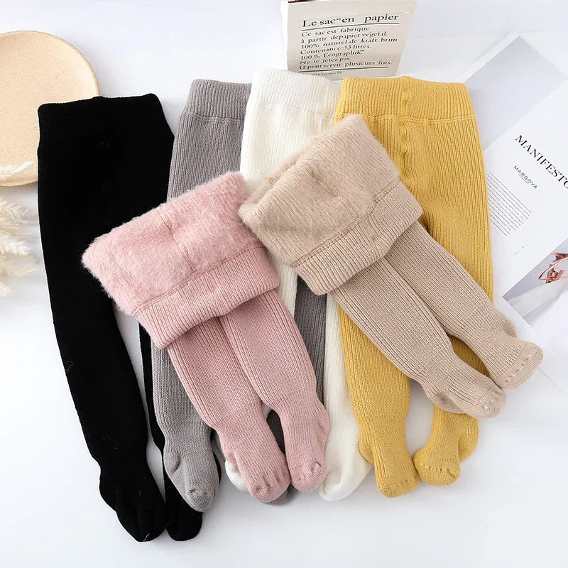 Colorful soft knit baby footed leggings with fleece lining in black, gray, white, yellow, pink, and beige