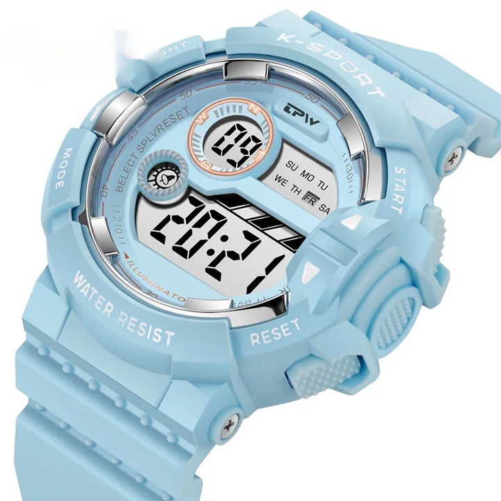 Light blue K-Sport digital watch with water resistance, multiple buttons, and an illuminated display