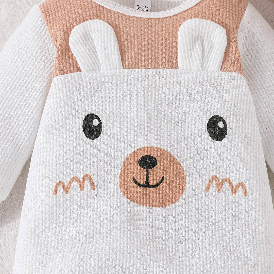 White and light brown baby romper with cute bear face and ears design, size 0-3 months