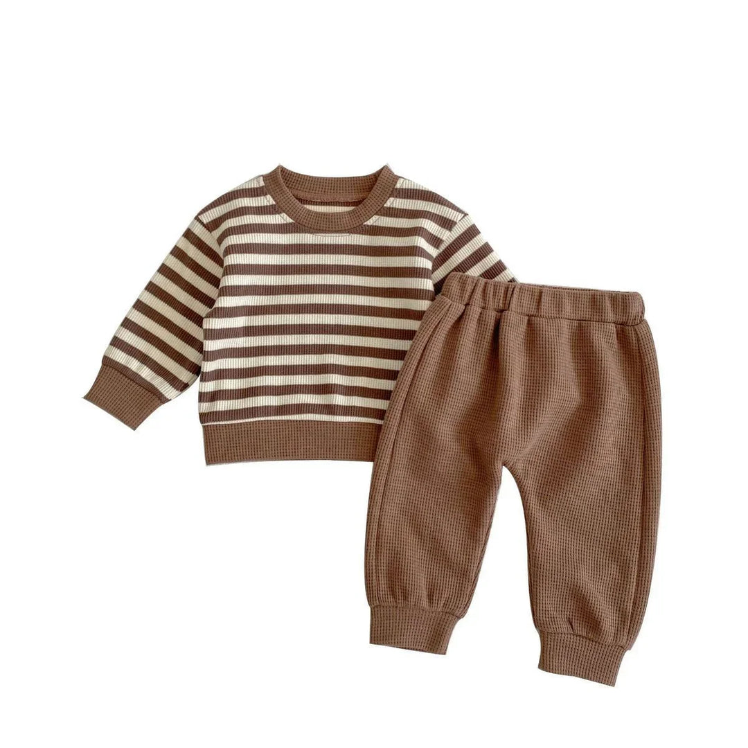 Children's waffle knit two-piece outfit with brown and cream striped sweater and solid brown pants