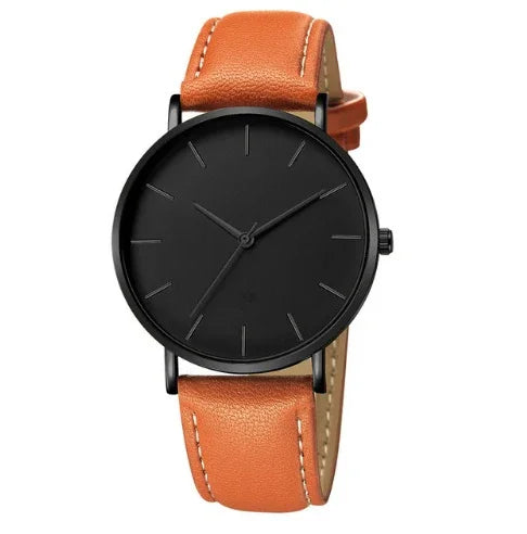Minimalist black dial wristwatch with black case and brown leather strap on white background