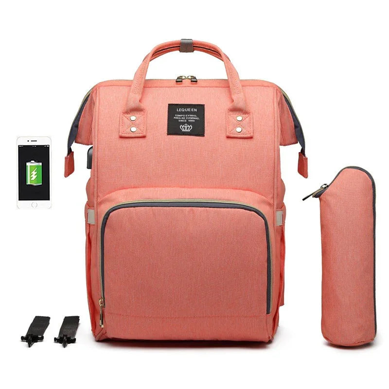 coral pink LEQUEEN backpack with front zipper pocket, dual handles, USB charging port, and matching insulated bottle bag