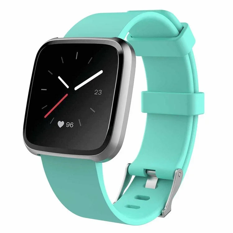 Modern smartwatch with black square screen and turquoise silicone strap showing heart rate and time