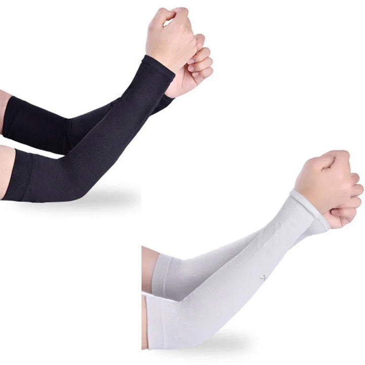 Hands wearing black and light gray compression arm sleeves on white background