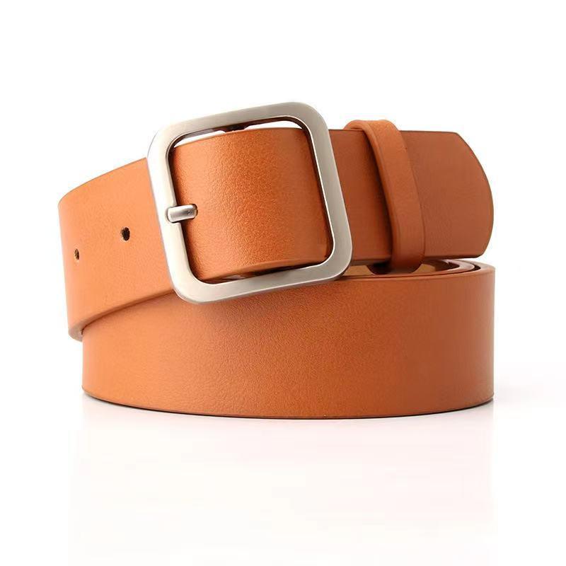Tan leather belt with silver square buckle on white background