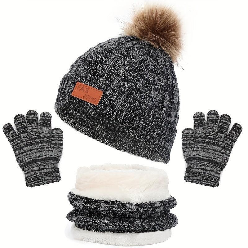 Gray knit winter hat with fur pom-pom, matching striped gloves, and a soft fleece neck warmer set