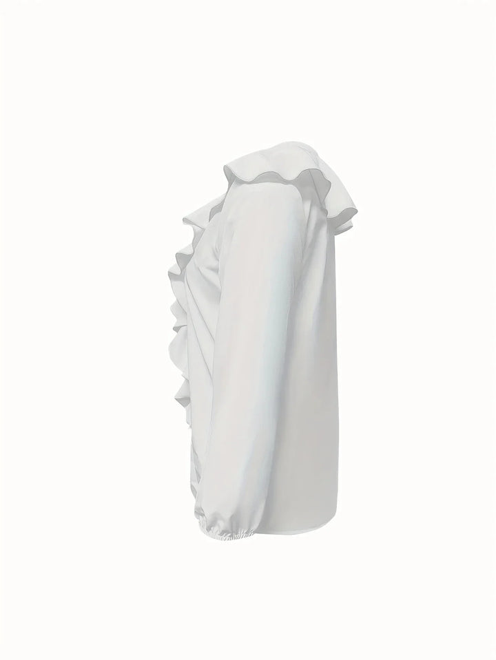 White long sleeve blouse with ruffle trim down front and around collar, elastic cuffs