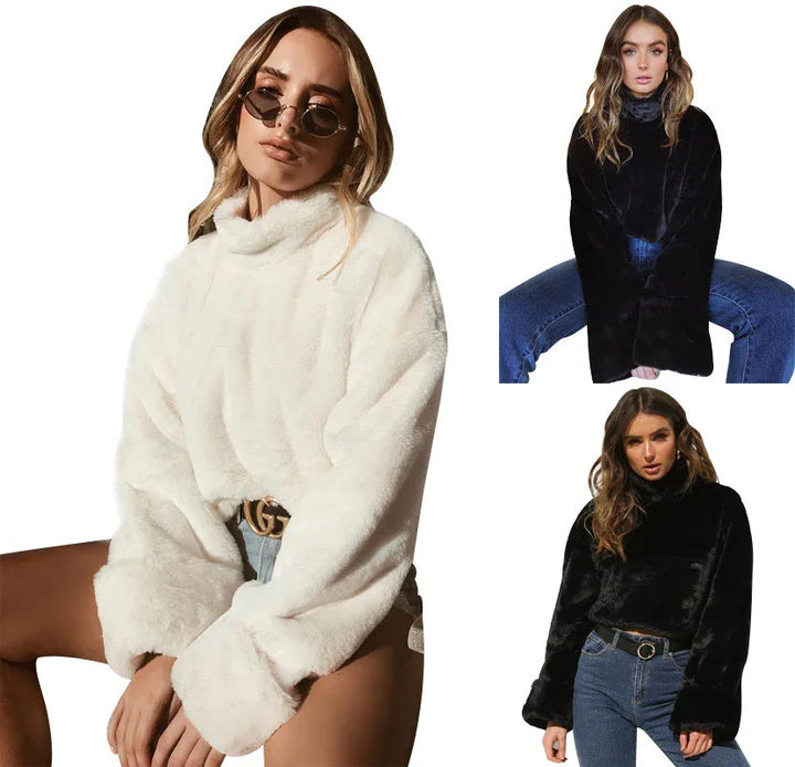 Women wearing stylish soft faux fur turtleneck sweaters in white and black with casual denim jeans