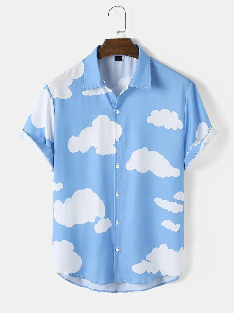 Light blue short sleeve button-up shirt with white cloud pattern on wooden hanger