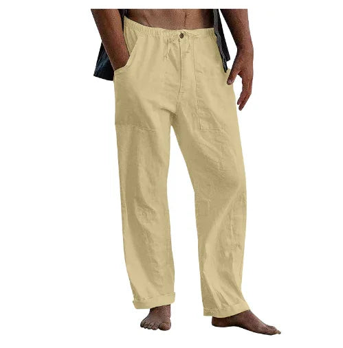 Men's casual beige linen pants with elastic waistband and pockets, relaxed fit, barefoot model