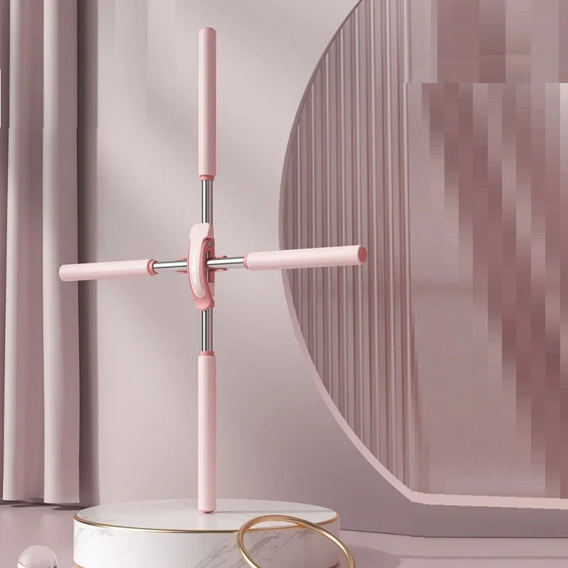 Pink adjustable stretching tool on marble table, modern minimalist room decor