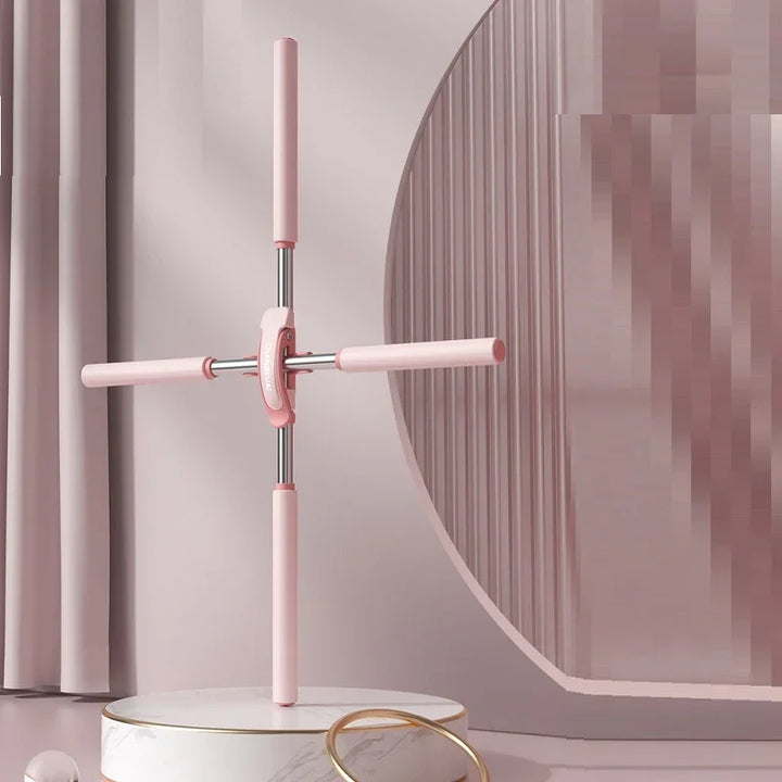 Pink adjustable stretching tool on marble table, modern minimalist room decor