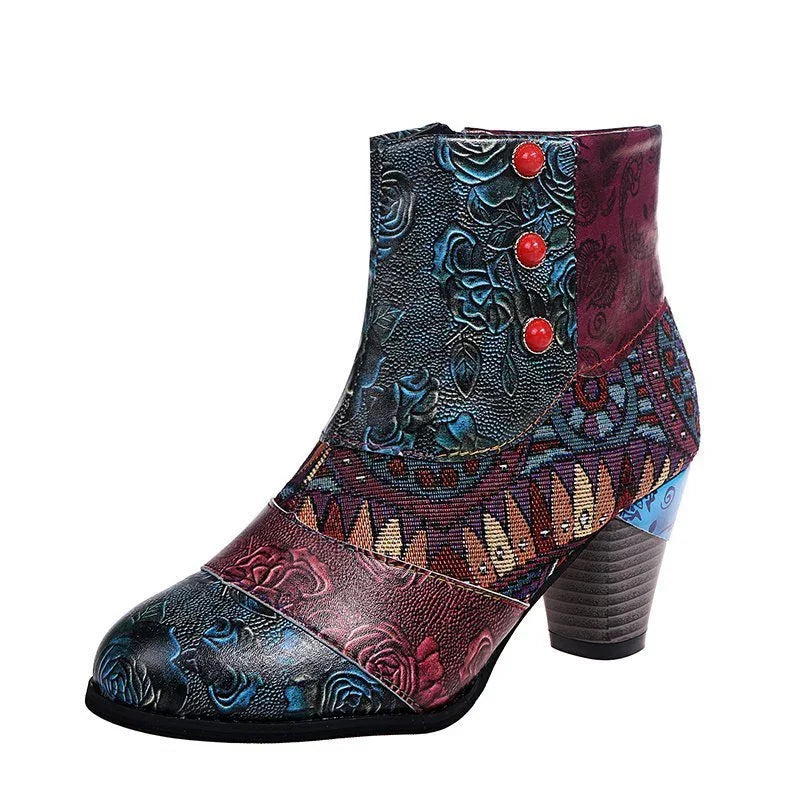 Colorful leather ankle boot with floral embossing, geometric fabric, red buttons, and stacked heel