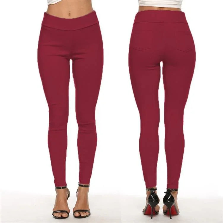 Front and back view of woman wearing wine red high-waisted skinny pants with black high heel sandals