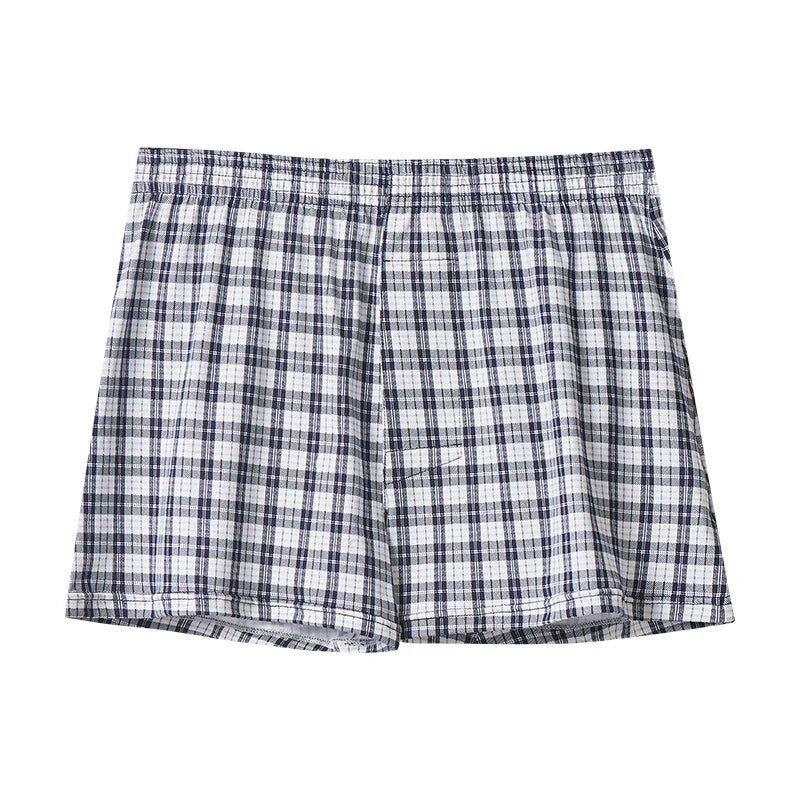 Men's plaid boxer shorts with elastic waistband in navy and white check pattern