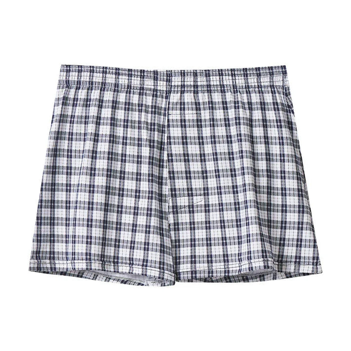 Men's plaid boxer shorts with elastic waistband in navy and white check pattern