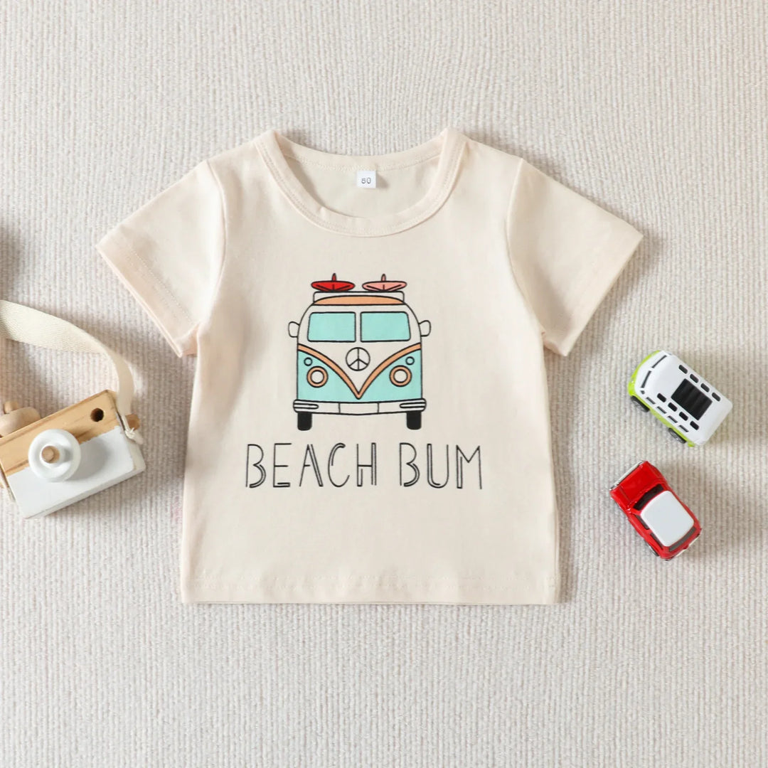 Cream kids t-shirt with blue vintage van and 'Beach Bum' text on textured background
