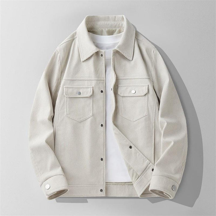 Light beige corduroy jacket with front buttons and chest flap pockets on white background