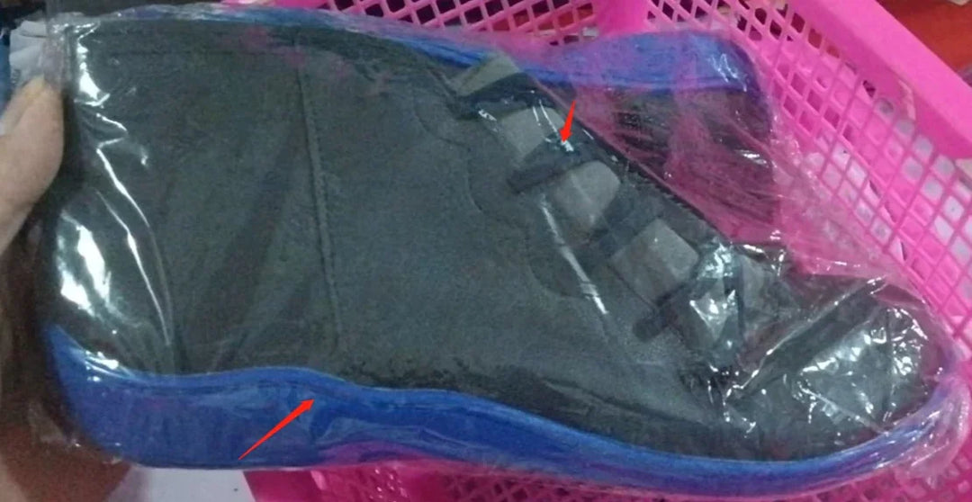 Black and blue casual shoe inside pink plastic basket wrapped in clear plastic packaging