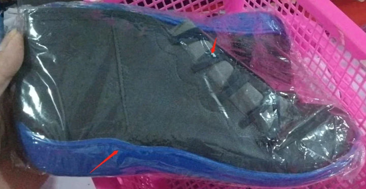 Black and blue casual shoe inside pink plastic basket wrapped in clear plastic packaging
