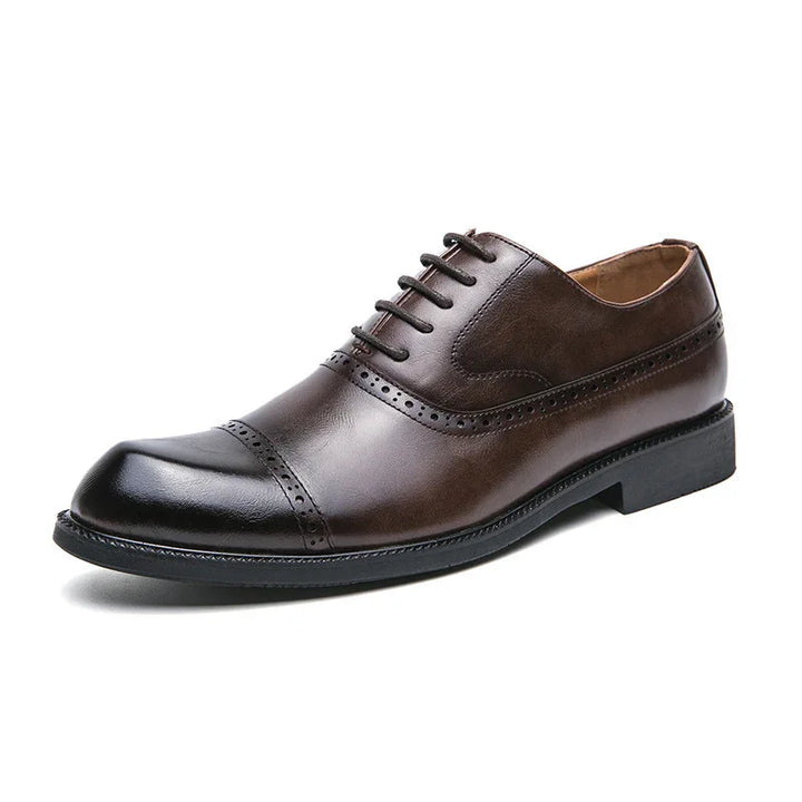 Men's brown and black leather oxford dress shoe with brogue detailing and lace-up design