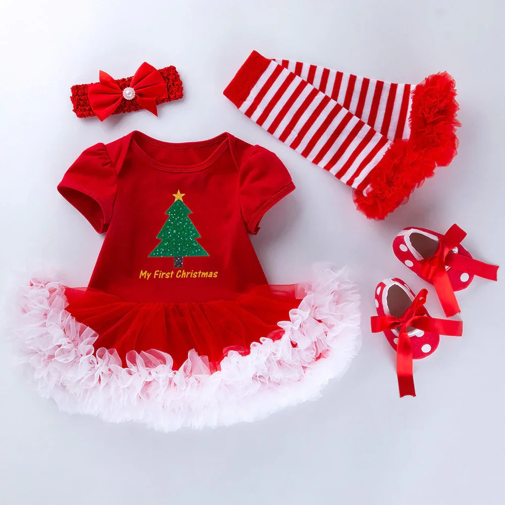 Red baby Christmas dress with green tree and text, striped leggings, headband, and polka dot shoes
