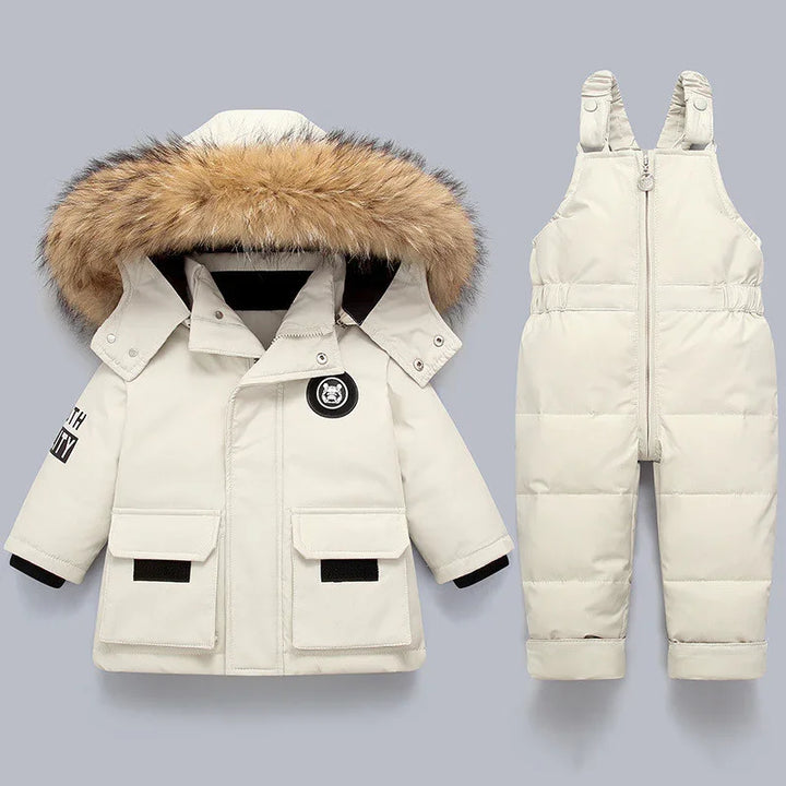 cream toddler winter jacket with fur hood and matching insulated snow bib overalls