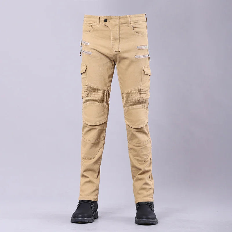 Men's beige cargo pants with zipper and flap pockets, ribbed knee panels, styled with black boots
