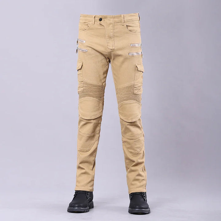 Men's beige cargo pants with zipper and flap pockets, ribbed knee panels, styled with black boots